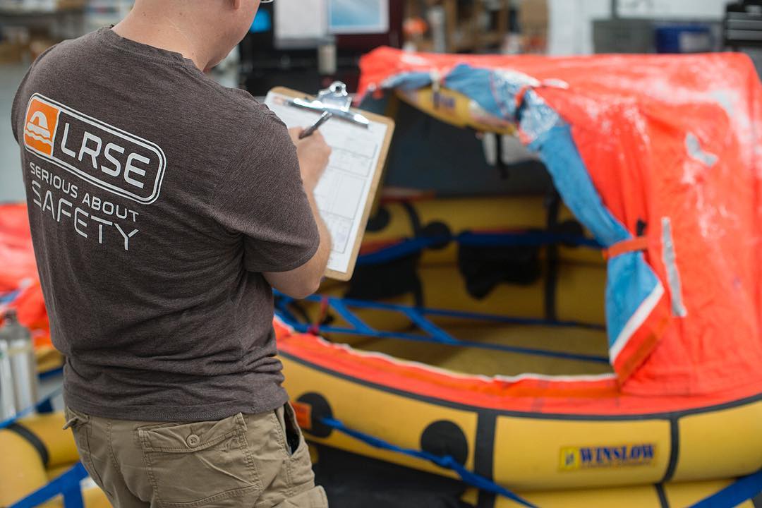 What goes into servicing a life raft?